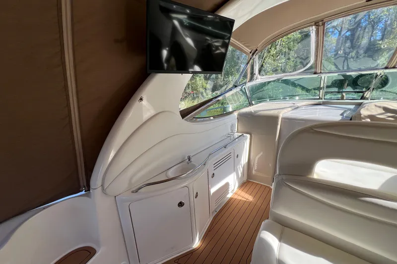 Slide: The Image of 2002 Sea Ray 360 Sundancer Port side Wet Bar and TV - 6