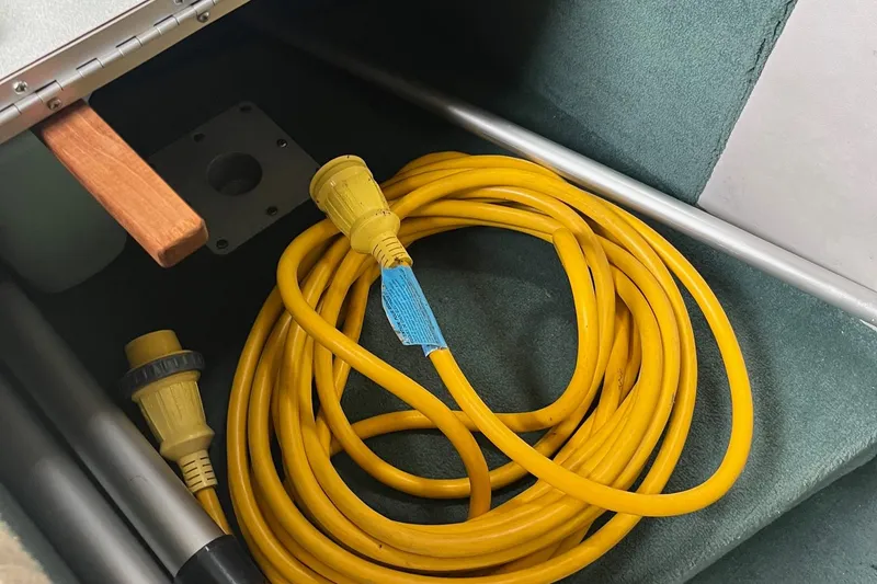 Slide: The Image of Yellow power cable in 1991 Sea Ray 270 Sundancer boat interior. - 7