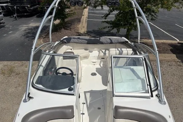 Slide: The Image of 2007 Yamaha AR 230 boat interior with open windshield and seating area. - 11