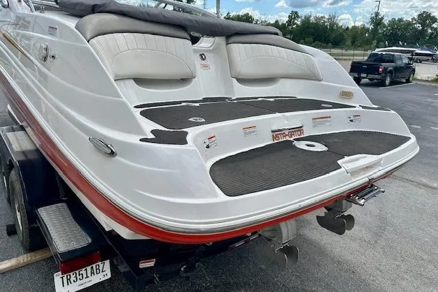 Slide: The Image of 2007 Yamaha AR 230 boat on trailer, rear view with seating and swim platform. - 3