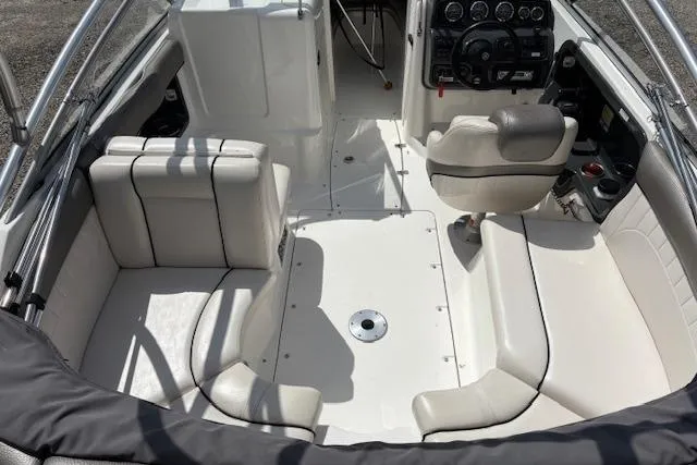 Slide: The Image of 2007 Yamaha AR 230 boat interior with seating and control panel. - 5