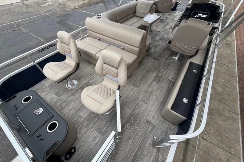 Slide: The Image of 2025 Ranger 220F pontoon boat interior with luxurious seating and modern design. - 9