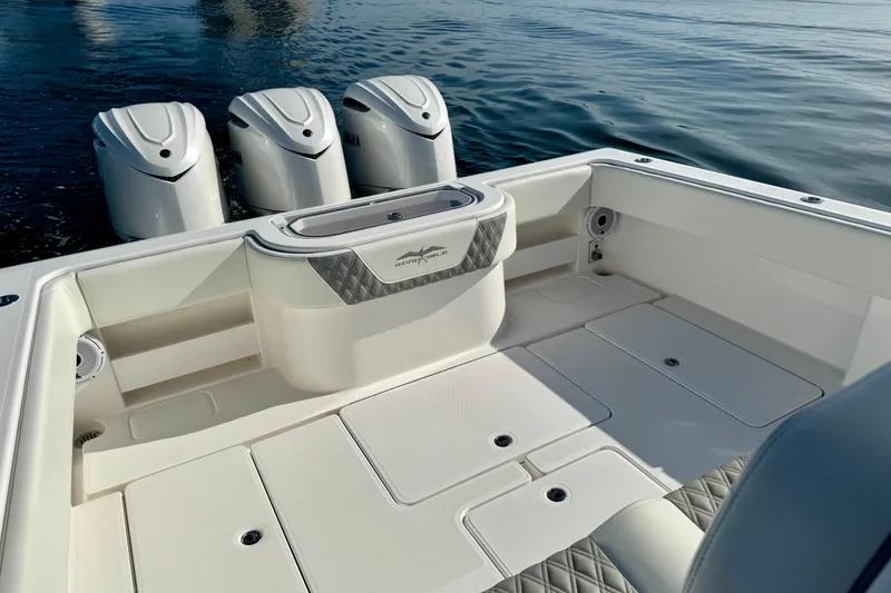Slide: The Image of 2024 Invincible 39 Open Fisherman boat with quad engines, spacious deck, and sleek design. - 17