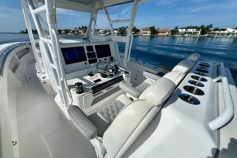 Slide: The Image of 2024 Invincible 39 Open Fisherman boat interior with modern helm and seating. - 5