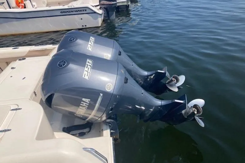 Slide: The Image of 2014 Grady-White Freedom 285 boat with twin Yamaha 250 outboard motors. - 8