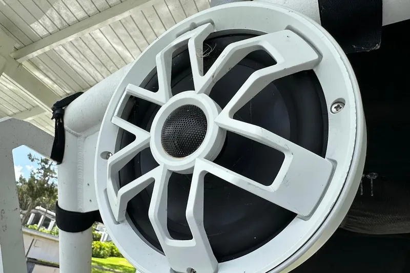 Slide: The Image of Close-up of a white speaker on a 2021 Axis A20 boat. - 17
