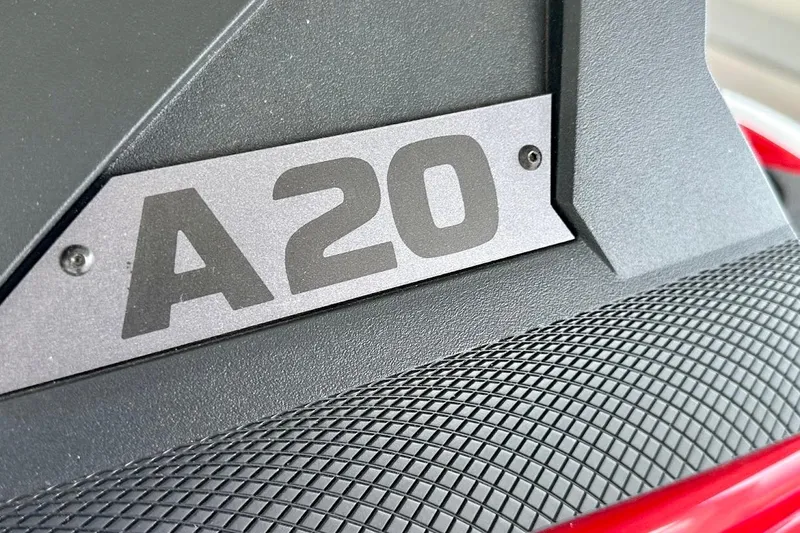 Slide: The Image of Close-up of 2021 Axis A20 model nameplate on textured surface. - 40