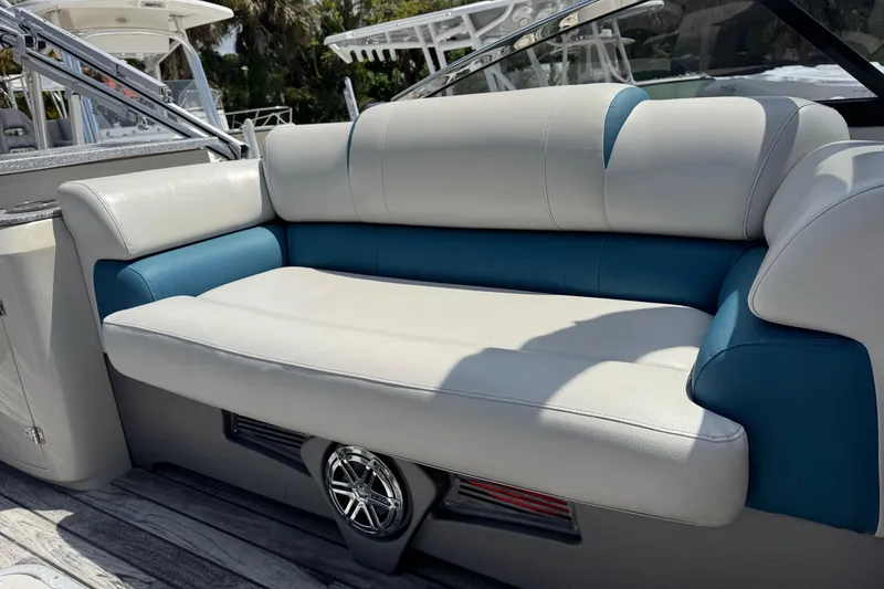 Slide: The Image of Luxurious seating on 2019 Avalon Catalina Platinum Elite Windshield boat, featuring elegant upholstery. - 21