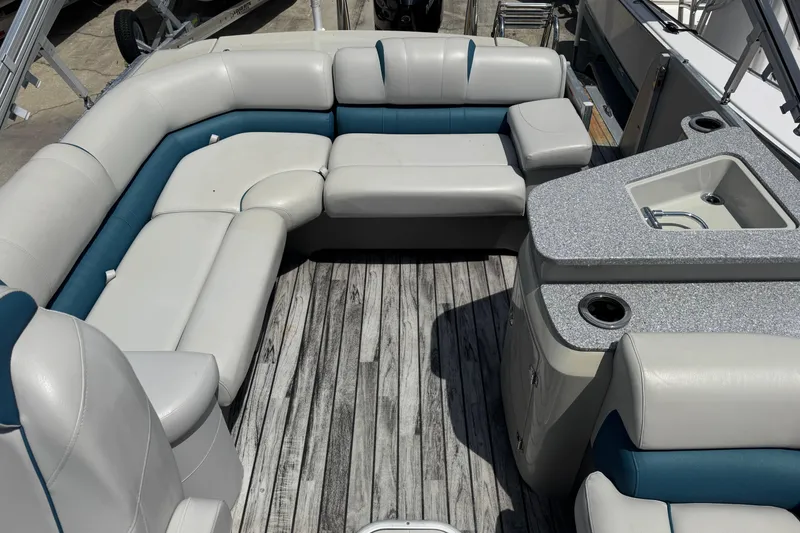 Slide: The Image of Luxurious seating and sink area on 2019 Avalon Catalina Platinum Elite Windshield boat. - 23