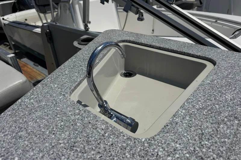 Slide: The Image of Granite countertop with sink on 2019 Avalon Catalina Platinum Elite boat. - 29