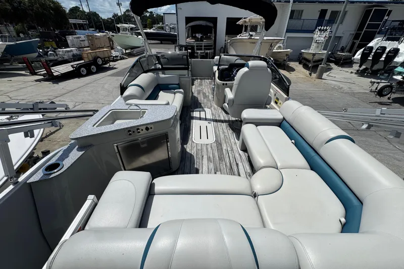 Slide: The Image of 2019 Avalon Catalina Platinum Elite boat interior with luxurious seating and modern amenities. - 33