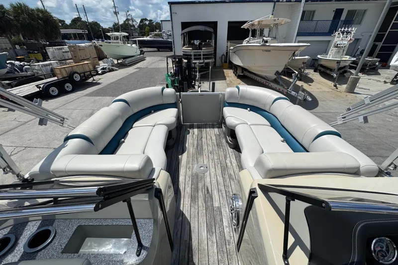 Slide: The Image of 2019 Avalon Catalina Platinum Elite pontoon boat with spacious seating and modern design. - 38