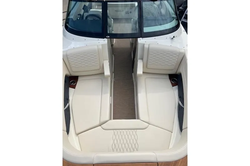 Slide: The Image of 2026 Chris-Craft Sportster 28 boat interior with luxurious cream seating and elegant design. - 22