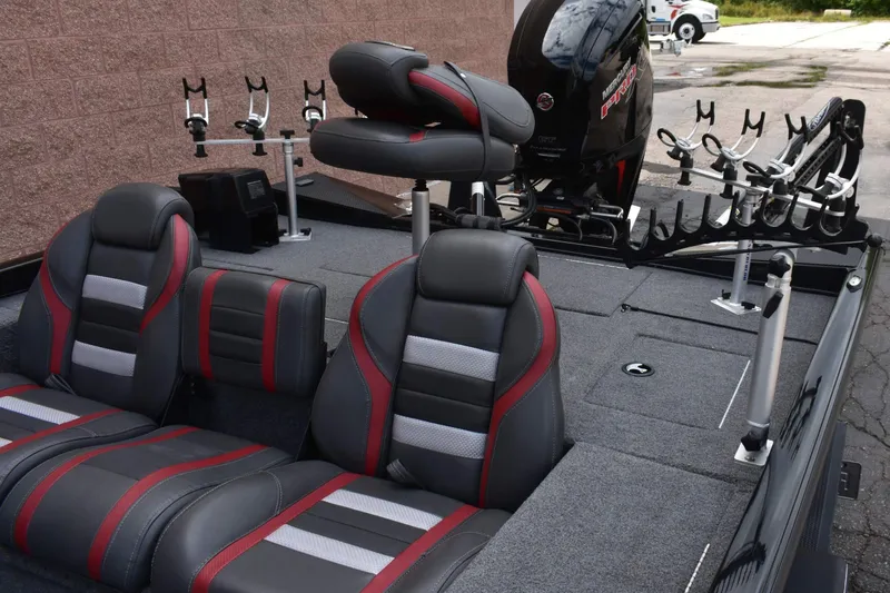 Slide: The Image of 2021 Ranger RT188C fishing boat interior with seating and rod holders. - 4