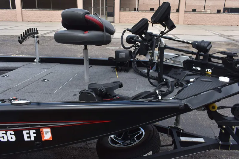 Slide: The Image of 2021 Ranger RT188C fishing boat with advanced electronics and seating on a trailer. - 6