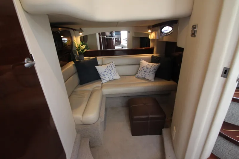 Slide: The Image of Interior of 2008 Sea Ray 44 Sundancer yacht with cozy seating and decorative pillows. - 34