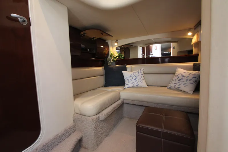 Slide: The Image of Luxurious interior of 2008 Sea Ray 44 Sundancer yacht with plush seating and cushions. - 36