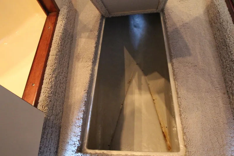 Slide: The Image of Storage compartment in 2008 Sea Ray 44 Sundancer boat interior. - 40