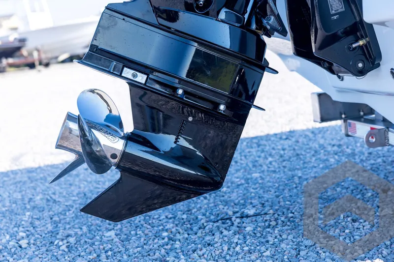 Slide: The Image of Outboard motor of 2026 Tidewater 2110 Bay Max on gravel surface. - 19