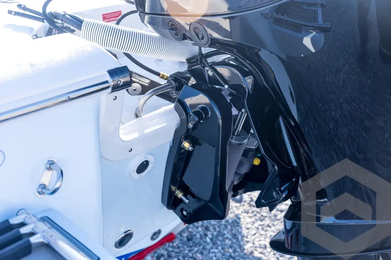 Slide: The Image of Close-up of 2026 Tidewater 2110 Bay Max boat engine and transom details. - 25