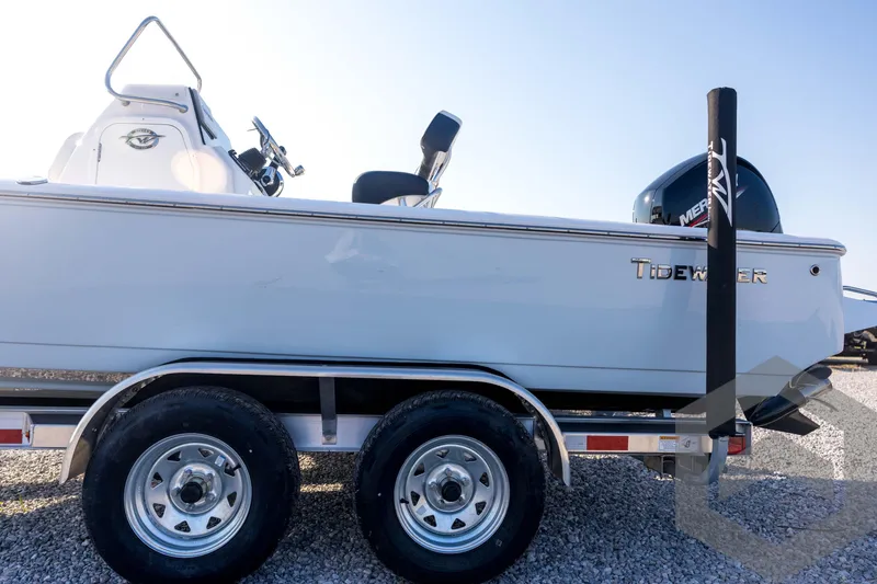 Slide: The Image of 2026 Tidewater 2110 Bay Max boat on trailer, side view, sunny day. - 28