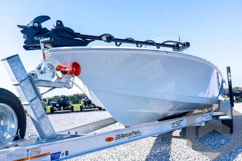 Slide: The Image of 2026 Tidewater 2110 Bay Max boat on trailer, featuring Garmin equipment. - 30