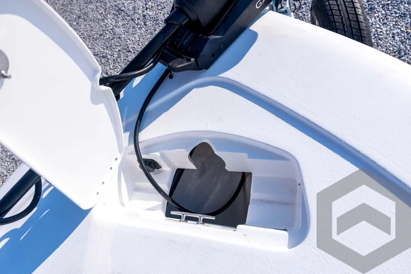 Slide: The Image of 2026 Tidewater 2110 Bay Max boat compartment with open hatch and cables. - 34