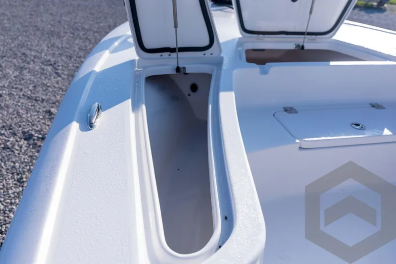 Slide: The Image of 2026 Tidewater 2110 Bay Max boat storage compartments open on deck. - 36