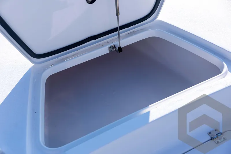 Slide: The Image of Open storage compartment on 2026 Tidewater 2110 Bay Max boat. - 37