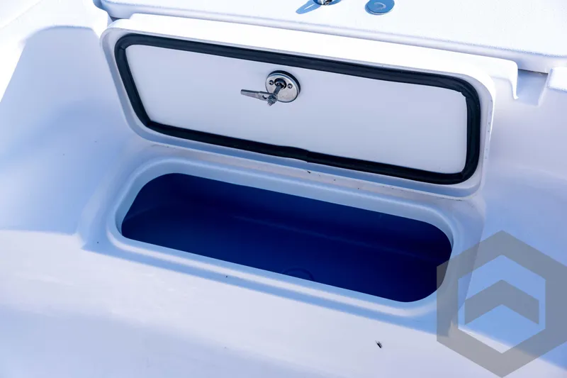 Slide: The Image of 2026 Tidewater 2110 Bay Max boat storage compartment with secure latch. - 40