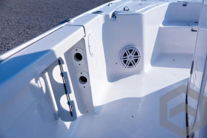 Slide: The Image of 2026 Tidewater 2110 Bay Max boat interior with speaker and storage compartments. - 42