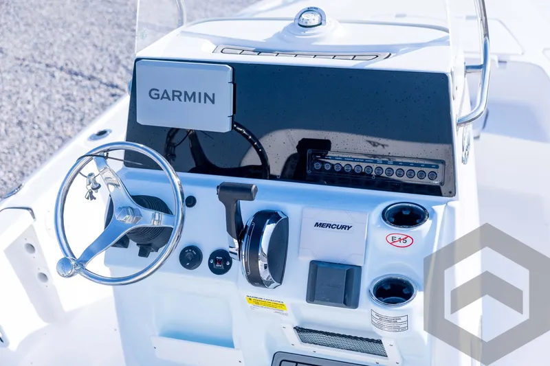 Slide: The Image of 2026 Tidewater 2110 Bay Max boat console with Garmin and Mercury controls. - 49