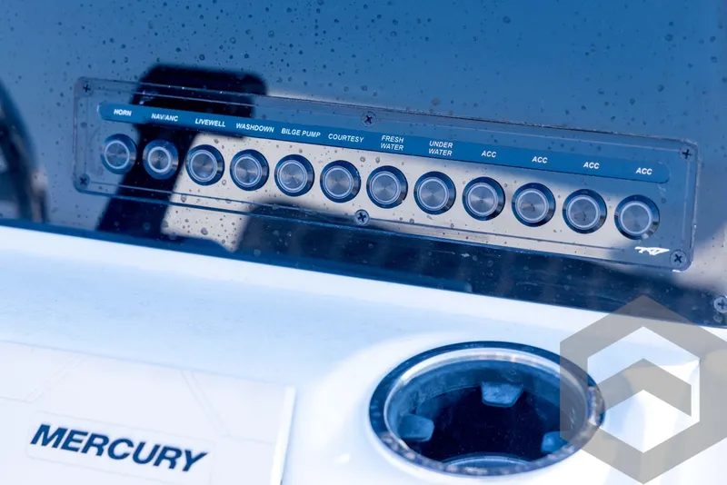 Slide: The Image of Control panel of 2026 Tidewater 2110 Bay Max boat with Mercury branding. - 50