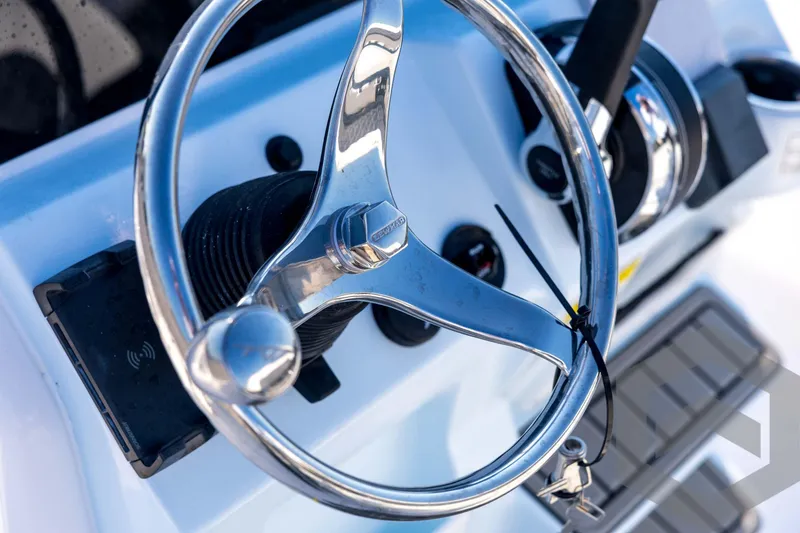 Slide: The Image of Steering wheel of 2026 Tidewater 2110 Bay Max boat, close-up view. - 55