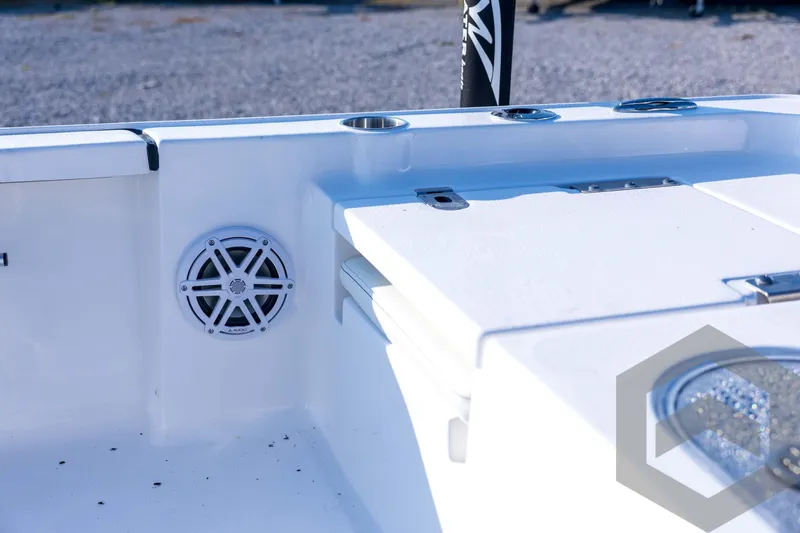 Slide: The Image of 2026 Tidewater 2110 Bay Max boat interior with speaker and storage compartment. - 61