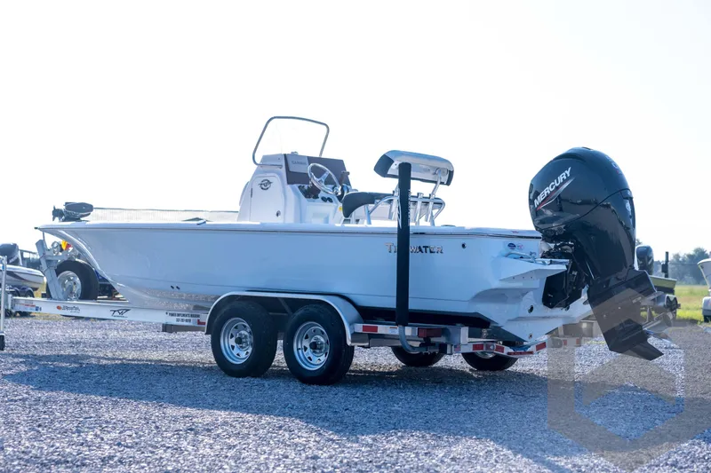 Slide: The Image of 2026 Tidewater 2110 Bay Max boat on trailer with Mercury outboard engine. - 7