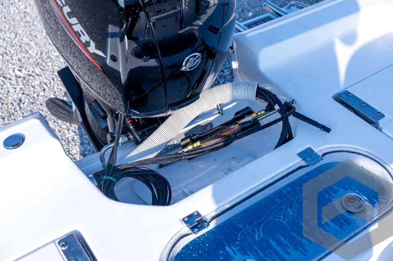 Slide: The Image of 2026 Tidewater 2110 Bay Max boat engine and deck details. - 71