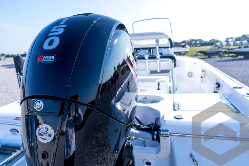 Slide: The Image of 2026 Tidewater 2110 Bay Max boat with powerful Mercury 150 engine, sleek design. - 74