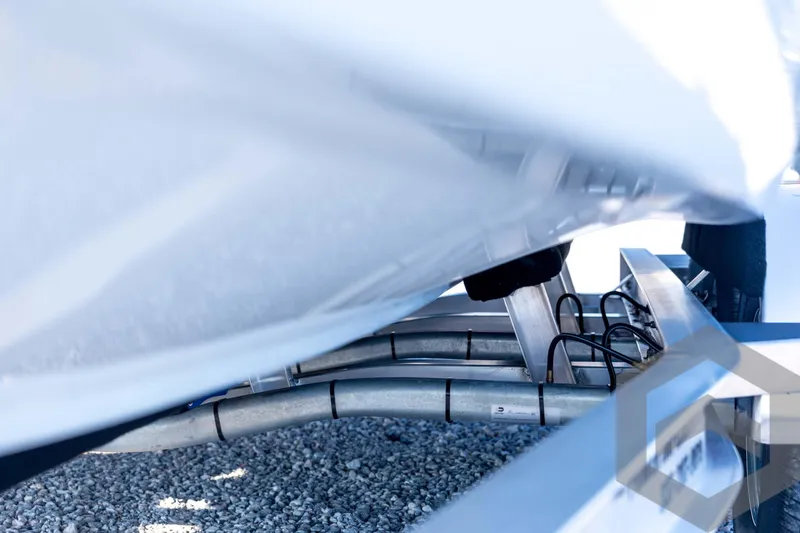 Slide: The Image of Close-up of 2026 Tidewater 2110 Bay Max boat hull on a trailer. - 78