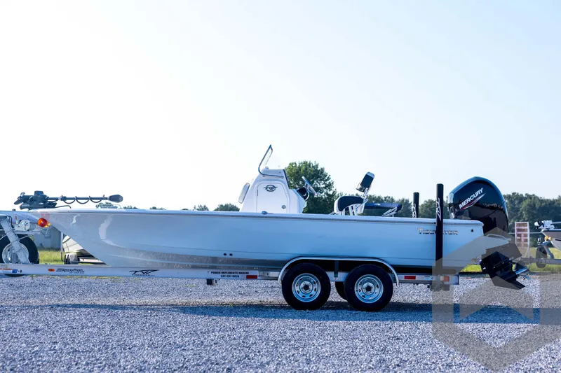 Slide: The Image of 2026 Tidewater 2110 Bay Max boat on trailer, side view, outdoors. - 8