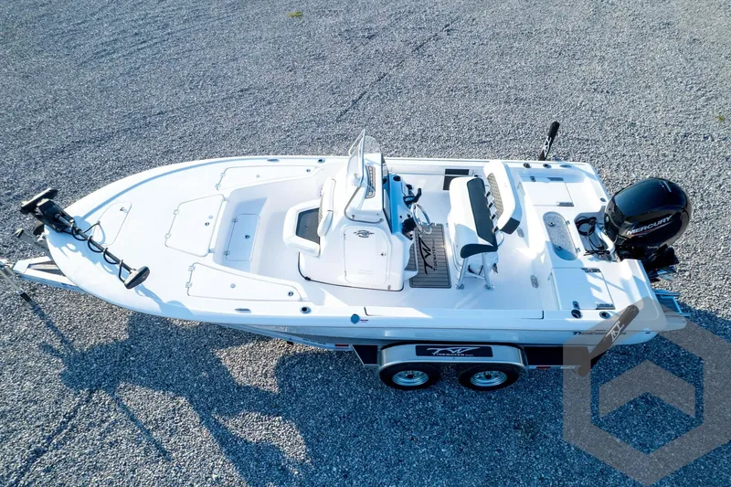 Slide: The Image of 2026 Tidewater 2110 Bay Max boat on trailer, aerial view, parked on gravel. - 82