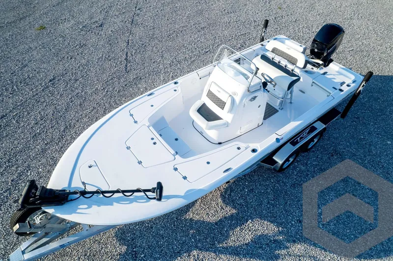 Slide: The Image of 2026 Tidewater 2110 Bay Max boat on trailer, aerial view, parked on gravel. - 83