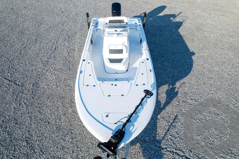 Slide: The Image of 2026 Tidewater 2110 Bay Max boat on gravel, top view, showcasing deck layout. - 84