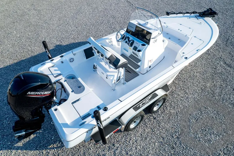 Slide: The Image of 2026 Tidewater 2110 Bay Max boat with Mercury engine on a trailer. - 87