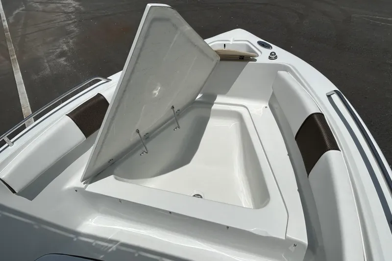 Slide: The Image of Open storage compartment on 2020 Key Largo 1800 CC boat deck. - 14