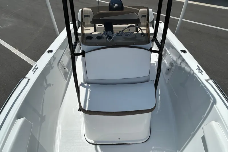 Slide: The Image of 2020 Key Largo 1800 CC boat interior with console and seating. - 9