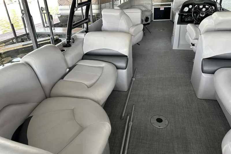 Slide: The Image of Interior of 2018 Landau Atlantis 250 Cruise boat with plush seating and modern dashboard. - 10