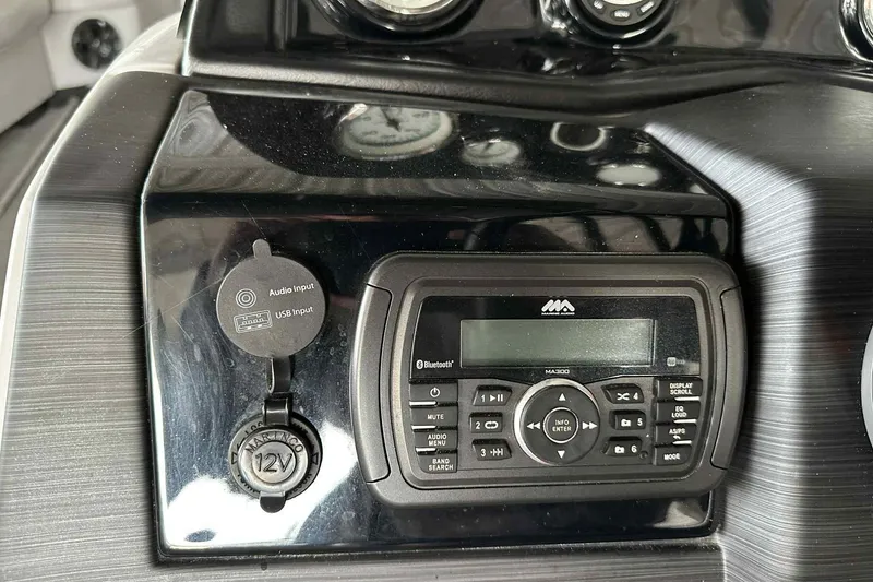 Slide: The Image of Dashboard of 2018 Landau Atlantis 250 Cruise with audio system and USB input. - 18