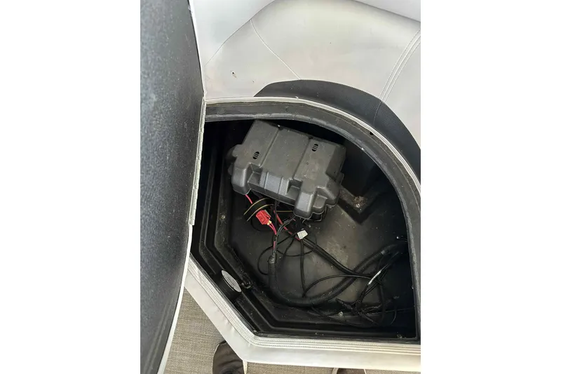 Slide: The Image of Battery compartment of 2018 Landau Atlantis 250 Cruise boat, showing wiring and connections. - 31