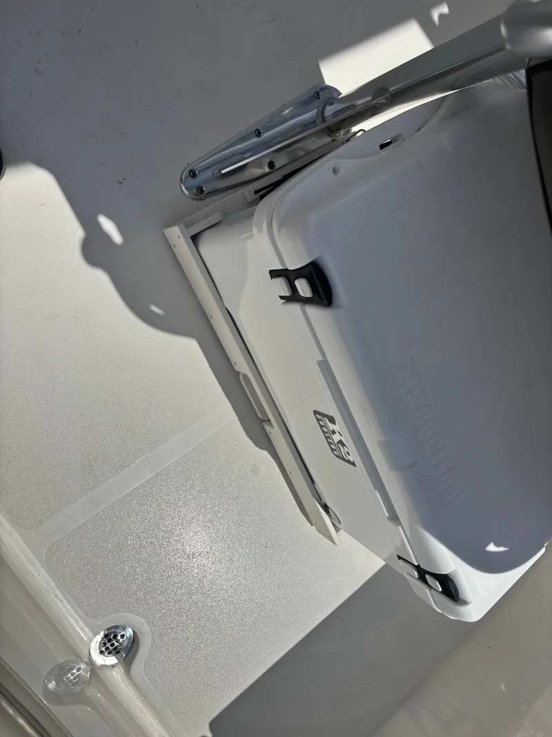 Slide: The Image of White cooler on Key West 203 FS boat deck, 2026 model. - 10